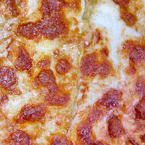 Dettaglio parmigiana con coste di bieta